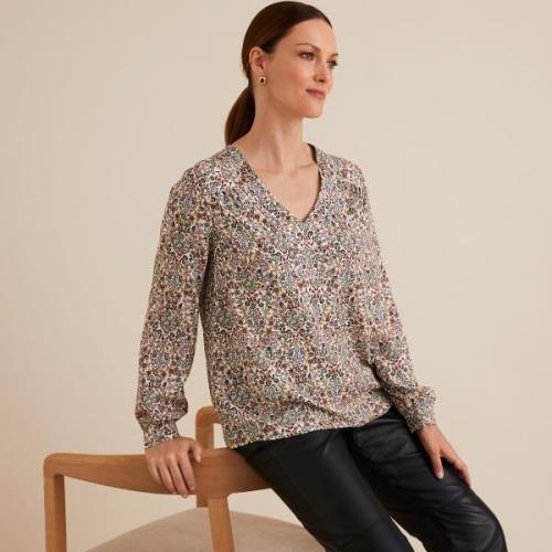 Blusa con cuello en V, estampado floral, manga larga